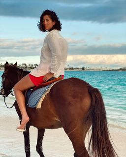 Garbiñe Muguruza feet photo thumbnail