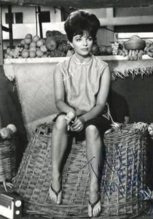 Joan Collins feet photo thumbnail