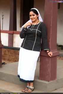 Kavya Madhavan feet photo thumbnail