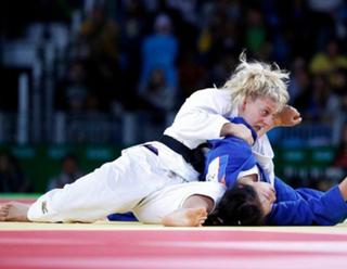 Kayla Harrison feet photo thumbnail