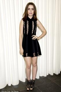Lily Collins feet photo thumbnail