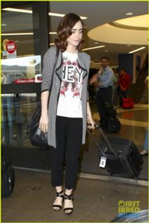 Lily Collins feet photo thumbnail