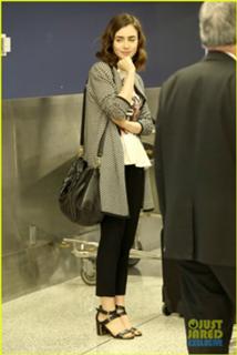 Lily Collins feet photo thumbnail