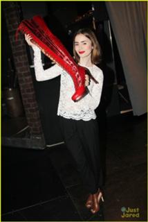 Lily Collins feet photo thumbnail