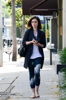 Lily Collins feet photo thumbnail