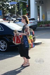 Lily Collins feet photo thumbnail