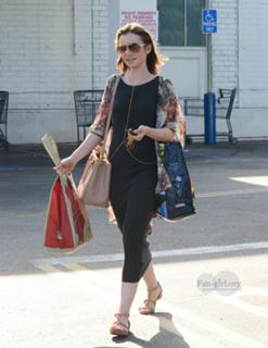 Lily Collins feet photo thumbnail