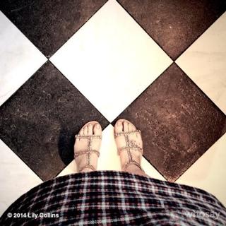 Lily Collins feet photo thumbnail