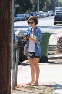 Lily Collins feet photo thumbnail