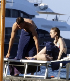 Lily Collins feet photo thumbnail