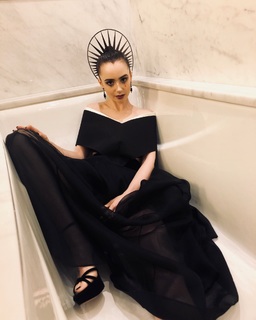 Lily Collins feet photo thumbnail