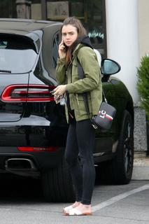 Lily Collins feet photo thumbnail