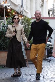Lily Collins feet photo thumbnail