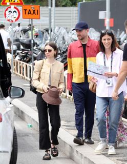 Lily Collins feet photo thumbnail