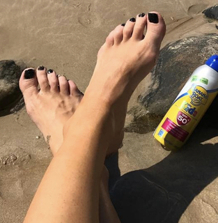 Madeleine West feet photo 6