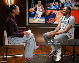 Malika Andrews feet photo thumbnail