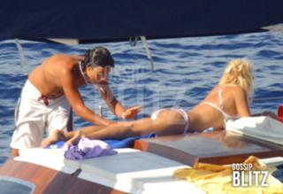 Maria De Filippi feet photo thumbnail