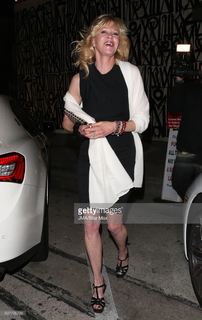 Melanie Griffith feet photo thumbnail