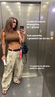 Melita Toniolo feet photo thumbnail