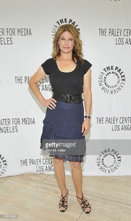 Nancy Travis feet photo thumbnail
