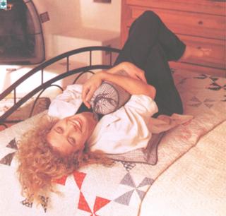 Nancy Travis feet photo thumbnail