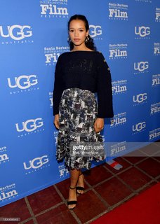 Taylor Russell feet photo thumbnail