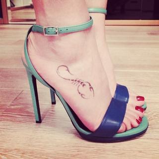 Tina Kandelaki feet photo thumbnail
